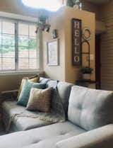 Living Room, Sofa, and Ceramic Tile Floor  Photo 4 of 27 in Nakomis Dwellings by Jake Skinner
