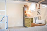 Bedroom, Wardrobe, Bunks, Medium Hardwood Floor, Recessed Lighting, Dresser, and Ceiling Lighting  Photo 17 of 22 in Marquette Modern by Jake Skinner