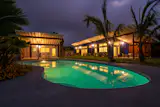 modern Hawaii beach house at night
