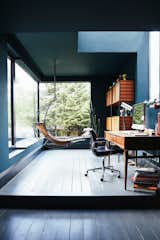 Making use of underused porch for home office and thinking space.  Enveloping one-color scheme helps you think.
