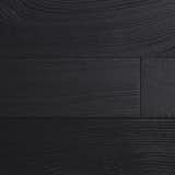 NETSU from the CHARRED collection by reSAWN TIMBER co. features rift and quarter sawn red oak burnt in the Japanese style of shou sugi ban.

NETSU can be used for interior wall cladding but is not appropriate for exterior applications.  The distinctive grain pattern of NETSU is from the rift & quarter sawn cuts.  QUARTER & RIFT SAWN lumber is produced by first cutting the log into quarters and then making alternating cuts that are perpendicular to the annual growth rings.  QUARTER SAWING produces boards with mostly vertical-grain and a distinctive figuring often referred to as “flecks”, “flakes” or “ray flecks” caused by the medullary rays of the log.  RIFT SAWN lumber produces a very consistent and quiet board face with mostly vertical-grain. this vertical-grain lends added stability to the QUARTER & RIFT SAWN boards making them less likely to cup or crown.