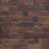 CHOCHOL is burnt in the Japanese style of shou sugi ban and can be used for interior wall cladding (call for exterior).CHOCHOL is one of several designs from CUBISM by reSAWN.

CUBISM by reSAWN TIMBER co. features several designs on WESTERN RED CEDAR.  CUBISM WESTERN RED CEDAR is thoughtfully created using blocks ranging in lengths from 3” to 11”. Using only Clear A&Better Mixed Grain WESTERN RED CEDAR, the blocks are joined together to create consistent plank dimensions of 11/16” thick X 6-3/4” wide X ALL 16’ Long with T/G joinery. The blocks are recovered from trim backs (typically a very high quality waste product) from various parts of the production process. The planks maintain the superior durability characteristics of WRC and has the additional benefits of staying straight and flat, allowing for little or no warp in the material prior to installation. The joinery adds graphic interest and a geometric pattern that both contrasts and compliments the natural grain of the cedar. 