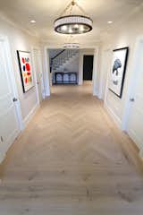 Main Line Residence featuring reSAWN TIMBER co.'s BASTILLE European White Oak flooring and Herringbone pattern