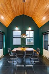 Dining Room, Table, Ceiling Lighting, Wall Lighting, Chair, and Ceramic Tile Floor  Photo 4 of 11 in Woodlea 43 by Kennect Building and Desing