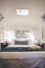 Airstream suites include queen-sized Casper mattresses with deluxe bedding. The pendant lights are from Schoolhouse Electric.