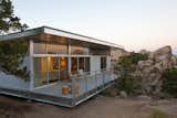 Manufactured with up to 70 percent recycled steel, the hybrid prefab home limits construction waste to the factory, where it's recycled. The efficiency and lightness of the resulting build is another environmental advantage.&nbsp;