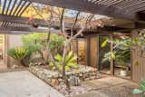 The dining room and bedrooms lead to a large garden patio.  Photo 9 of 11 in Snag This Midcentury Stunner in Southern California For $799K