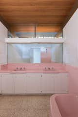 "The three original bathrooms were each designed in a different pastel color: pink, yellow, and blue,  Photo 7 of 9 in Nearly Slated For Destruction, a Restored Neutra in West Covina Asks $1.8M