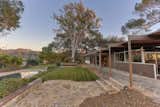 Ten of Neutra's signature spider-leg supports jut out from the house. Benjamin Moore's Coconut Grove and Van Buren Brown were applied to the exterior.  Photo 8 of 9 in Nearly Slated For Destruction, a Restored Neutra in West Covina Asks $1.8M