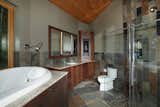 The tree that produced the white oak for the master bathroom previously grew in the same spot.  Photo 9 of 40 in Bathrooms by Michael R. Savarie from A Round Pennsylvania Prefab Offers 360-Degree Solutions in Sustainability