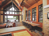 This home merges an open living space with a serene porch overlooking the water with a Marvin Ultimate Multi-Slide Door.  Photo 2 of 6 in How to Set the Stage For Outdoor Living With Scenic Doors