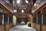 After Kelley's wife moved the horses to another property, he used one of the outbuildings as a design studio, and repurposed the barn for his classic car collection.