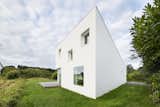 The residence seems to morph when viewed from different angles.