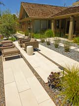 A private residence in Stanford, California, enjoys a varied patio landscape with Large Scale CalArc Pavers.