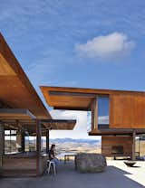 Exterior, Cabin Building Type, Metal Roof Material, Shed RoofLine, and Metal Siding Material The walls of the bar open up, giving it a playful  Photo 6 of 11 in A Steel-and-Glass Compound Is One Family’s Launchpad For Adventure