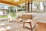 Living Room, Chair, Sofa, and Pendant Lighting  Photo 9 of 13 in The Stunningly Restored Hassrick Residence by Richard Neutra Hits the Market at $2.2M