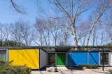 Built with a steel frame, the Frost House features panels of styrofoam between aluminum sheets for the exterior walls and styrofoam between plywood for the roof and floors. Bold, primary colors accentuate its geometric form.