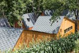 Exterior, Cabin Building Type, Gable RoofLine, House Building Type, Shingles Roof Material, and Wood Siding Material  Photo 7 of 9 in trade fair by Zum Schwarzen Ferkel from A Camping Village in South Korea Draws Inspiration From an Iconic Fairy Tale
