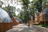 Exterior, Cabin Building Type, Shed Building Type, Gable RoofLine, and Wood Siding Material  Photos from A Camping Village in South Korea Draws Inspiration From an Iconic Fairy Tale