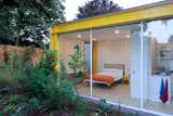 Bedroom and Bed  Photos from Fully Renovated, Wimbledon House by Richard Rogers Hosts New Architecture Fellows in London