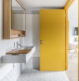Bath Room, Wall Mount Sink, and Ceramic Tile Floor  Photo 5 of 12 in Eden Locke by Dwell from Part Apartment, Part Boutique Hotel, Eden Locke Brings a New Brand of Comfort to Edinburgh