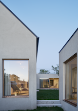 Windows, Casement Window Type, and Metal  Search “kindle case and notebook” from Sleek Scandinavian Design Permeates a Family’s Summer House in an Old Fishing Village