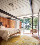 Bedroom, Bed, Table Lighting, Chair, and Cork Floor  Photos from A Stunningly Restored Midcentury by Case Study Architect Craig Ellwood Asks $800K in San Diego