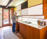 Kitchen, Colorful Cabinet, Cork Floor, and Drop In Sink  Photo 5 of 10 in A Stunningly Restored Midcentury by Case Study Architect Craig Ellwood Asks $800K in San Diego