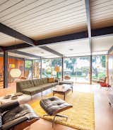 Living Room, Sofa, End Tables, Coffee Tables, Pendant Lighting, and Cork Floor  Photos from A Stunningly Restored Midcentury by Case Study Architect Craig Ellwood Asks $800K in San Diego