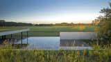 Celebrated Polo Player Nacho Figueras Commissions a Low-Slung, Concrete Stable - Photo 10 of 11 - 
