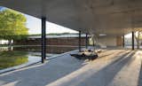 Celebrated Polo Player Nacho Figueras Commissions a Low-Slung, Concrete Stable - Photo 8 of 11 - 