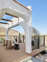 Heat-resistant and slip-resistant, TimberTech creates a safe environment for bare feet or paws.  Photo 4 of 6 in Bobby Berk’s Desert Hacienda Celebrates Outdoor Living With a High-Tech Deck