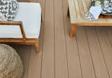 “I love the deck’s weathered teak color because it blends into this desert environment,” says Berk. “It’s also a very similar aesthetic to what I’m doing in the house, where everything is organic and natural with terra-cotta and light wood. So, it’s a beautiful extension of the indoor/outdoor environments we’re trying to create at Casa Tierra.”  Photo 5 of 6 in Bobby Berk’s Desert Hacienda Celebrates Outdoor Living With a High-Tech Deck