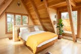 The couple’s first cabin had a sleeping loft, and it was a feature that they wanted for the A-frame, too. "<span style="font-family: Theinhardt, -apple-system, BlinkMacSystemFont, &quot;Segoe UI&quot;, Roboto, Oxygen-Sans, Ubuntu, Cantarell, &quot;Helvetica Neue&quot;, sans-serif;">It was something we recognized in our first cabin where it had the loft that not only did it have a sort of intimate, safer feel, it’s this primal, cocoon thing where you're in the woods, but you're up high,