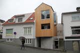 House in Stavanger, Norway: 
Nestled snugly between  more traditional homes of the last century, this 80 sqm row house is marks a gently urbanized stand against prevailing suburban and large-scale housing trends. 

Design: Austigard Arkitetur AS + 
Photo: Emile Ashley 
Source: http://www.archdaily.com/783039/house-in-stravanger-austigard-arkitektur