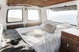 Cargo Van Mobile Studio bedroom with repurposed wood accents