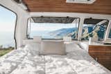 Cargo Van Mobile Studio bedroom with repurposed wood accents