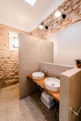 #IbizaInteriors #StandardStudios #Ibiza #CampoHouse #DesignMilk
Photos by Youri Claessens  Photo 1 of 31 in Bathrooms We'd Bathe In by Model Remodel from Historic Stable Becomes a Modern Guesthouse