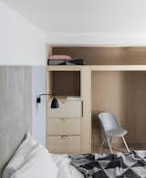 Bedroom, Bed, Chair, Wall Lighting, Light Hardwood Floor, and Storage  Photo 3 of 17 in Leman Locke by Dwell from Sleep, Stay, Work, and Play at the Leman Locke