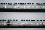 Dozens of essential oils line the walls of the in-house lab