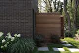 The Free Float Pool House's exterior shower is located on the back of the cabana, hidden from view.