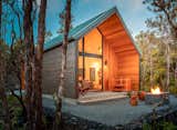 Exterior, Wood Siding Material, Metal Roof Material, House Building Type, Cabin Building Type, and Gable RoofLine  Photo 9 of 11 in Kūono at Volcano by groundSWELL partners