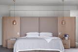 Copper-hued pendants stun in this bedroom primarily defined by natural and matte finishes. When it comes to bedroom lighting ideas for the ceiling, we can’t get enough of this look for both style and functionality.