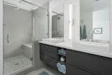 Bath Room, Engineered Quartz Counter, Vessel Sink, Porcelain Tile Floor, Freestanding Tub, Enclosed Shower, Porcelain Tile Wall, and Two Piece Toilet Master shower   from Favorites