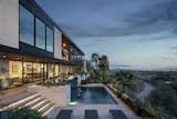 A new hot tub, firepit and pool pull the homeowners out towards the view at all times of the year