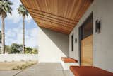 The covered entry, like the rest of the house, focuses on line, color and composition, using simple materials, distinctive geometries and the desert sky  Photo 3 of 23 in Weave by The Ranch Mine