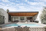 The private courtyard revolves around a pool, instead of a traditional water fountain, for cooling down in the desert heat while adding humidity to the air creating a more comfortable micro-climate for the shaded outdoor room. 
