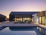 The gabled volume of the house blocks the harsh, setting sun from the courtyard, creating the ideal space for enjoying the pool after work in the summer 