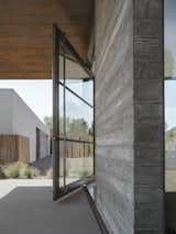 Exterior, Stucco Siding Material, ADU Building Type, Glass Siding Material, Metal Siding Material, Flat RoofLine, and Concrete Siding Material Board formed concrete wall detail  Photo 7 of 10 in casiTa by The Ranch Mine