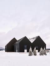Exterior, House Building Type, Metal Roof Material, and Gable RoofLine Exterior in the winter  Photo 1 of 31 in Noir Peaks by The Ranch Mine